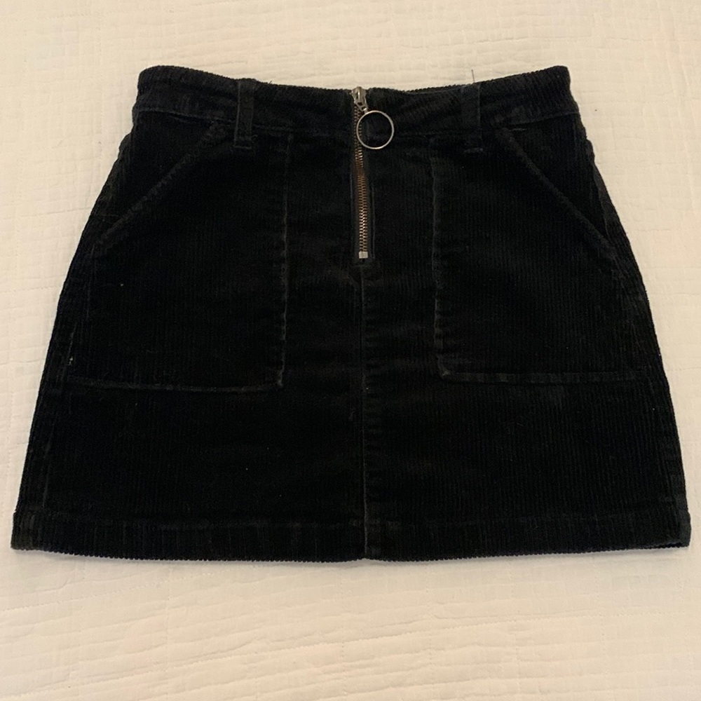 Black corduroy mini skirt with pockets